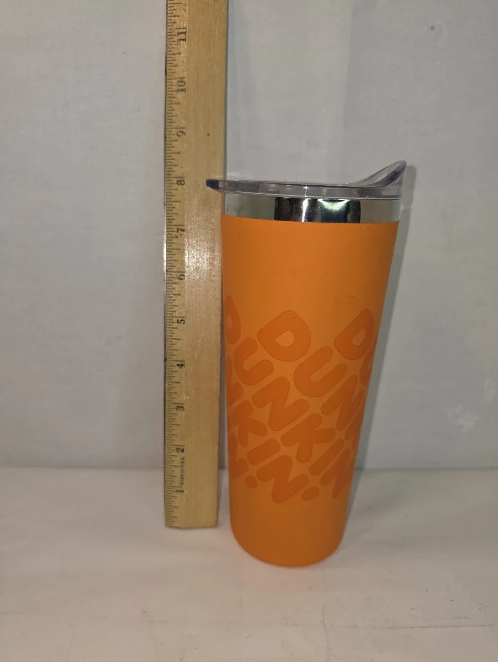 Dunkin' 20 oz Insulated Stainless Steel Tumbler, vibrant orange soft touch grip.